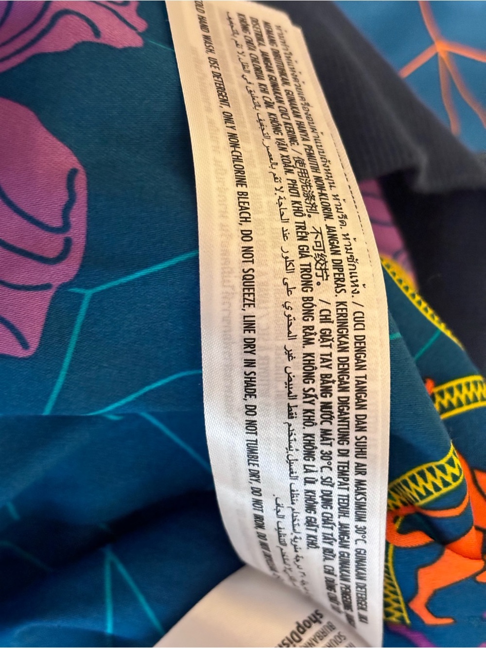 Reversible Marvel Blue Bomber Jacket with Purple Floral and Orange Chain Details - Picture 13 of 16